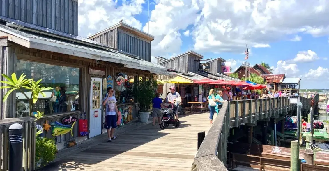 Johns Pass boardwalk scene in Madeira Beach, Florida, showcasing a vibrant coastal community.