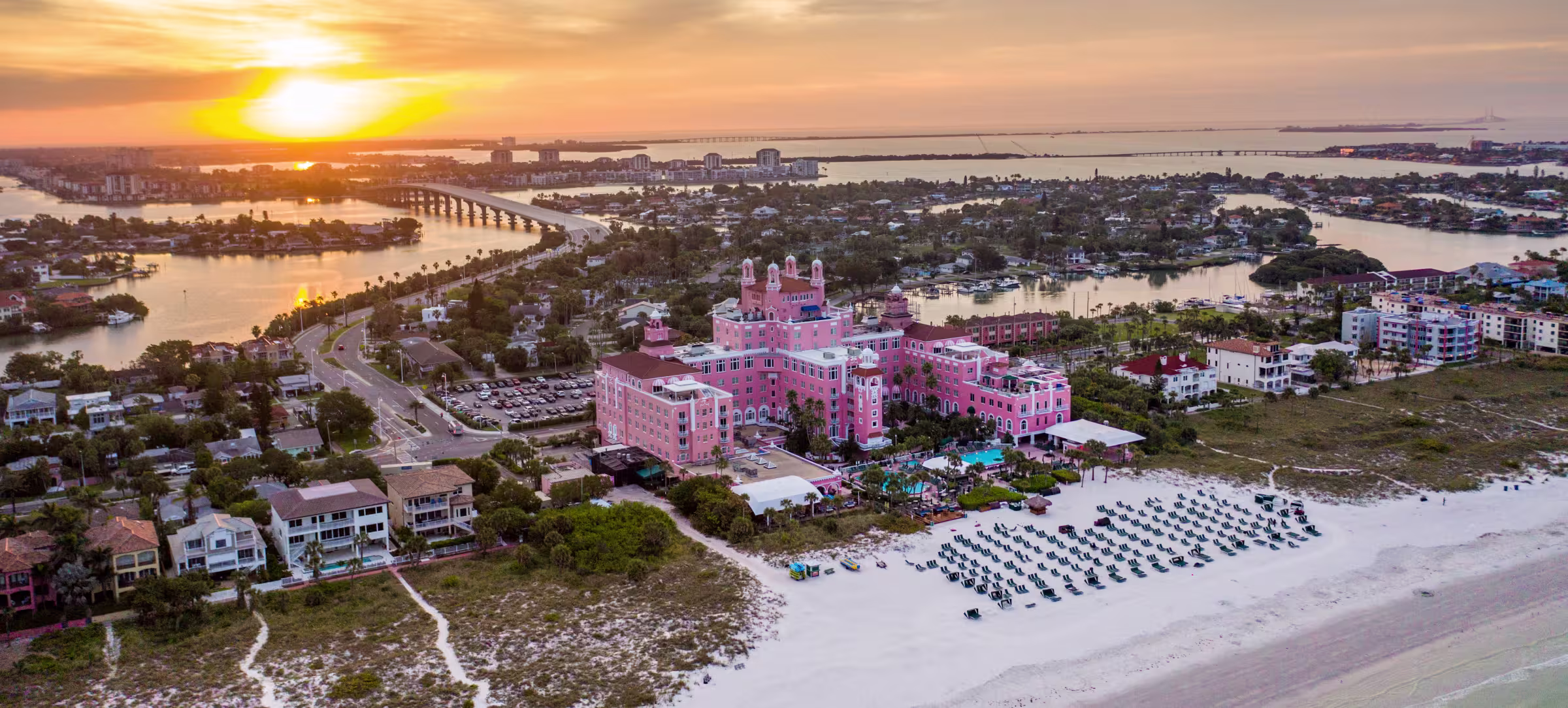 Pink hotel and beach scene in St. Pete Beach, Florida, illustrating Tampa Bay Home Services