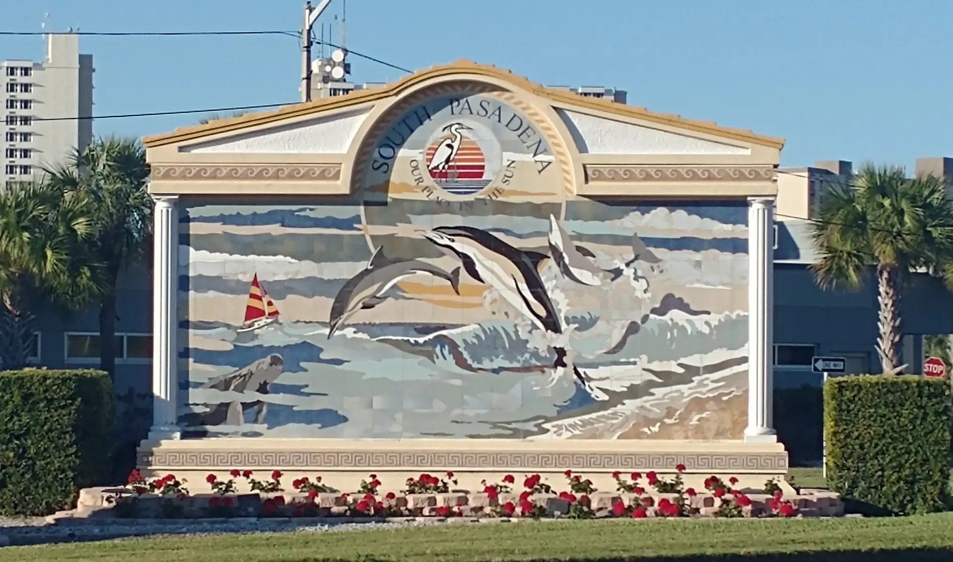 South Pasadena city sign with dolphin mural, professional house cleaning services in South Pasadena, FL.