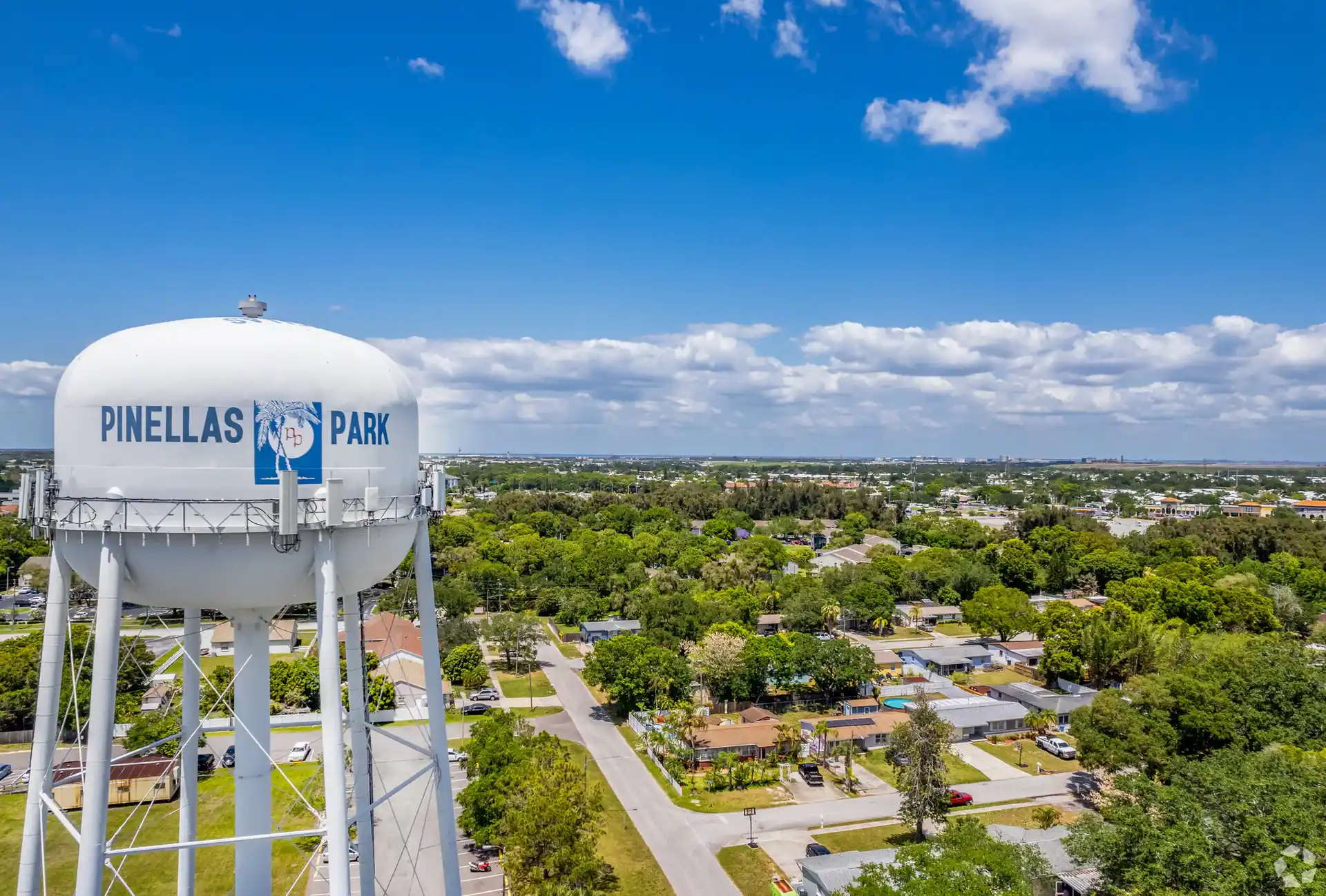 Pinellas Park water tower landmark over residential neighborhood, Tampa Bay Home Services service area.